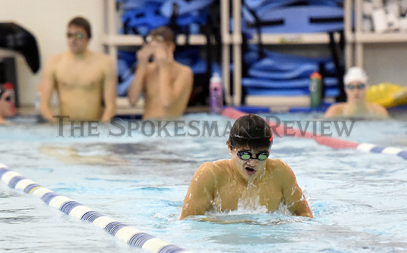 DANIEL ROY SWIMS LAPS DURING PRACTICE