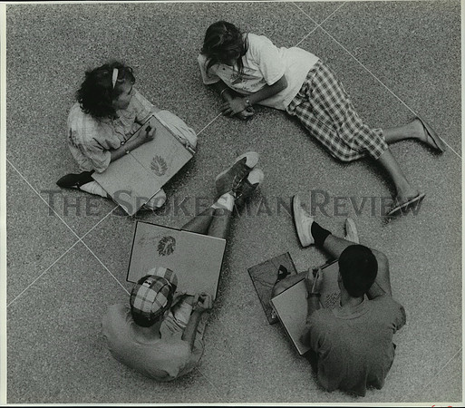 1989 Press Photo North Central Students signing the North Central Yearbook