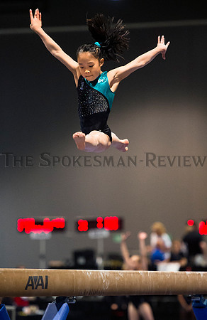 SYDNEY KHO ON THE BALANCE BEAM, GYMNASTICS