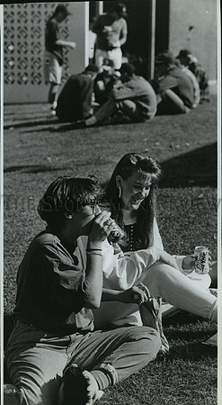 1991 Press Photo Central Valley High School students hold cans of soft drinks