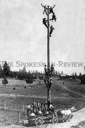TELEGRAPH, TELEPHONE, POWER, LINEMEN ON POLE