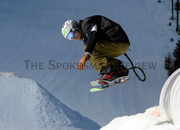 WACY LOE RIDES A SNOWSKATE