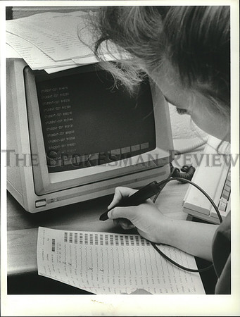 1988 Press Photo Central Valley HS senior Stacy Sparks logs attendance