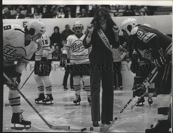 1974 Press Photo Miss Spokane Judith Likarish throws down ceremonial first puck