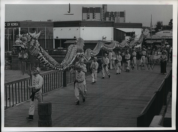 1974 Press Photo Sequin-scaled Chinese dragon, as honor guard for Chinese party.