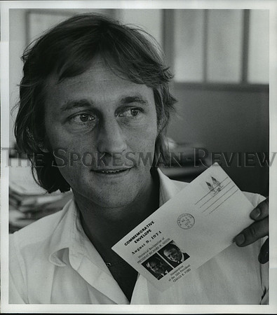 1974 Press Photo Dr. Voelker Martin holds one of the philatelic covers at Expo.