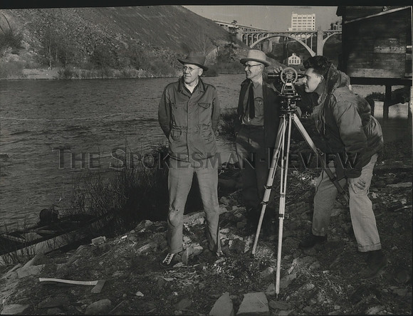1955 Press Photo Surveyors & engineers measure Spokane river bottom