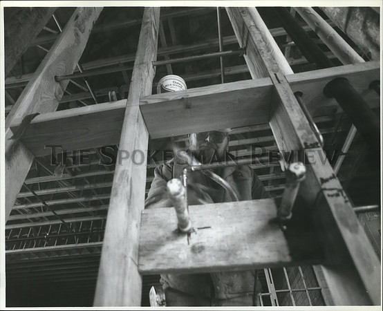1991 Press Photo Rod Lynch works on plumbing in the new high school in SandPoint