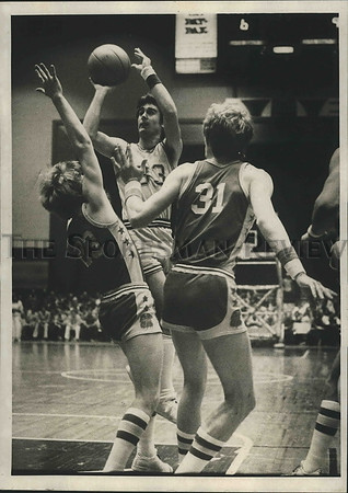 1980 Press Photo A player pulls up for a jumper during a state tournament game
